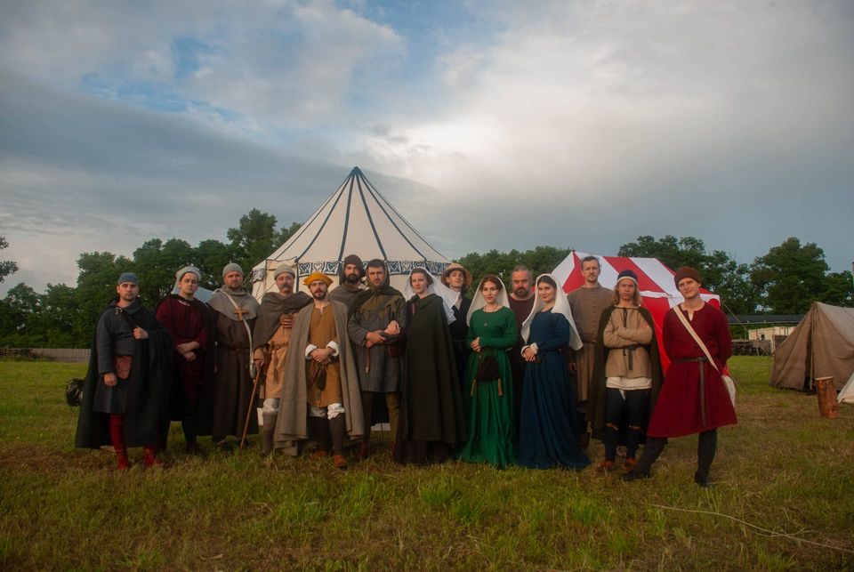 Group of reenactors at a living history camp