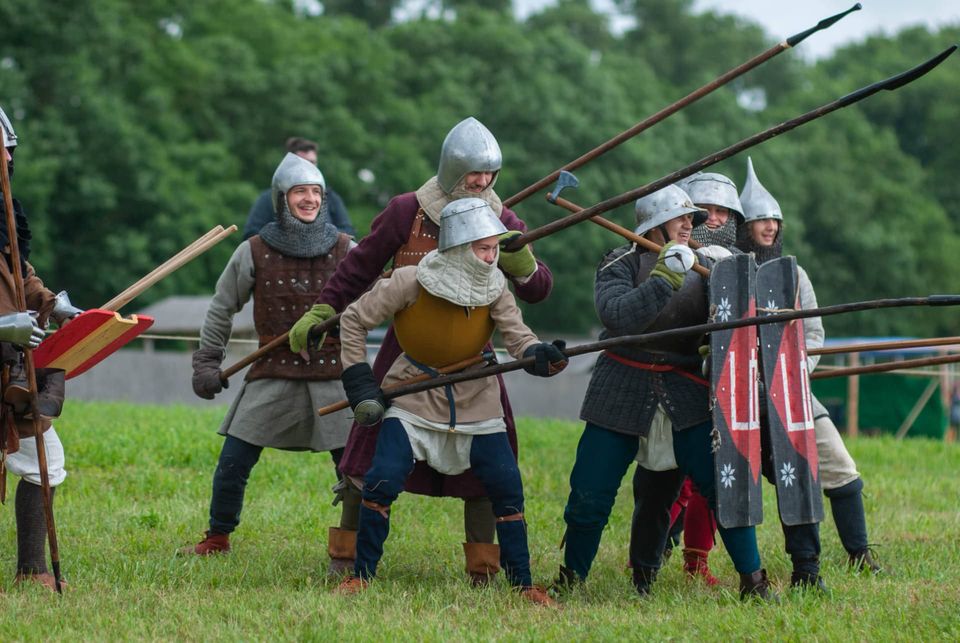 Line of reenactors with spears